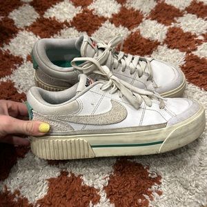 White and green platform Nike sneakers